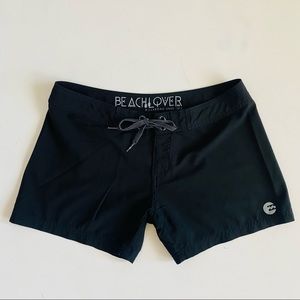 Billabong woman’s black surf swim shorts size 3
